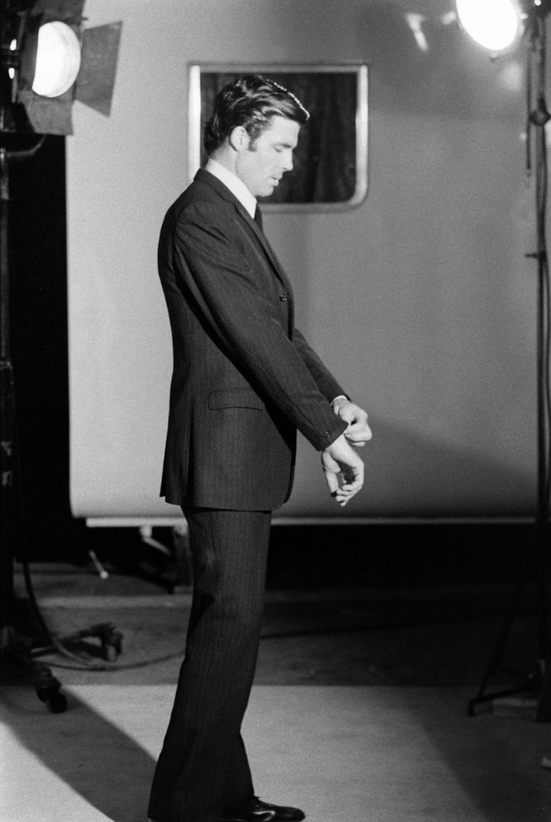 James Bond hopeful Robert Campbell adjusts his shirt and jacket, 1967.