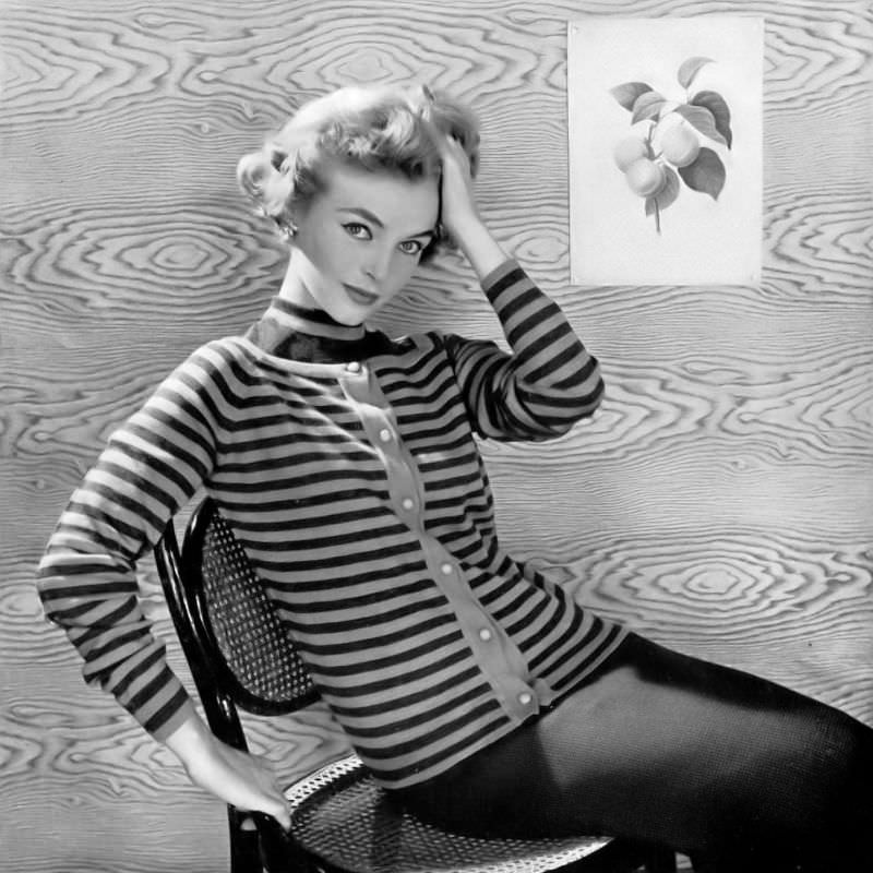Joan Olson in sporty twin-set of gray and green stripes by Korrigan Lesur, 1953