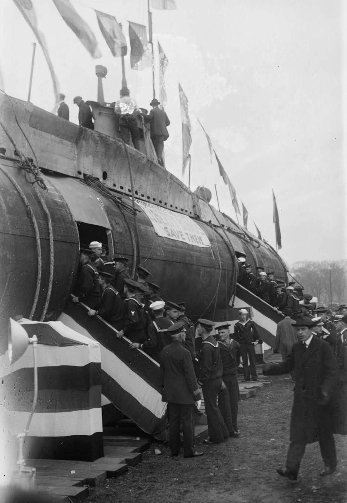 Sailors tour the U-boat’s interior.