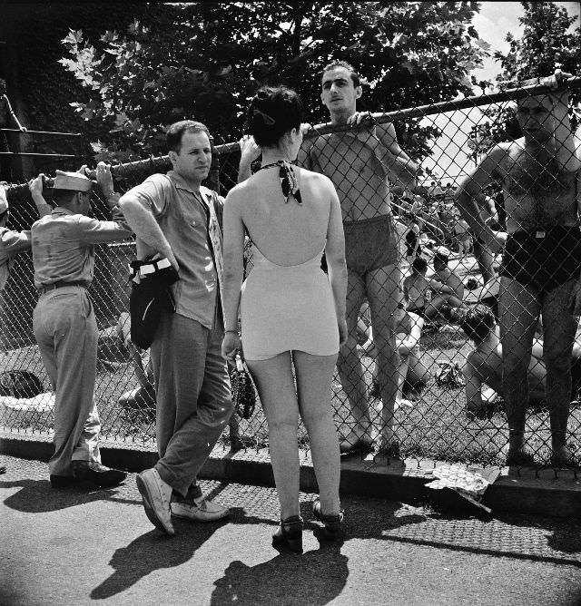 Sunday crowds are so great at the municipal swimming pool that long lines form awaiting their turn, Washington, D.C., July 1942
