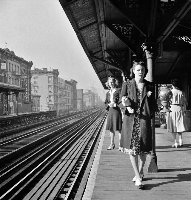 Waiting for the Third Avenue elevated railway in the Sixties about 8-45 a.m., New York, New York, September 1942