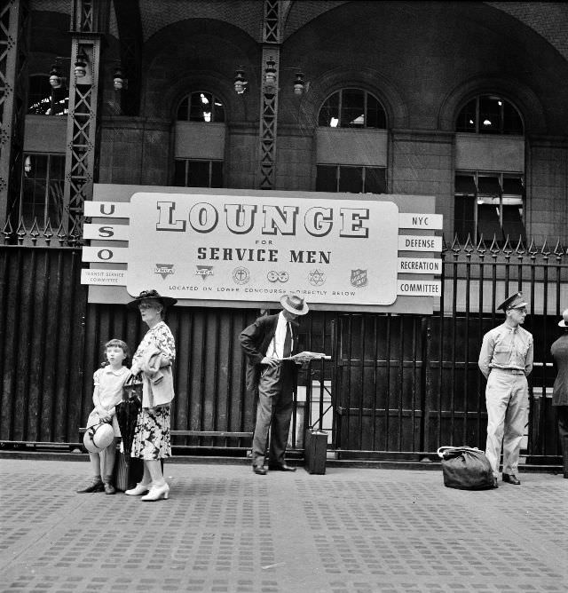 Waiting for trains at the Pennsylvania railroad station, New York, August 1942