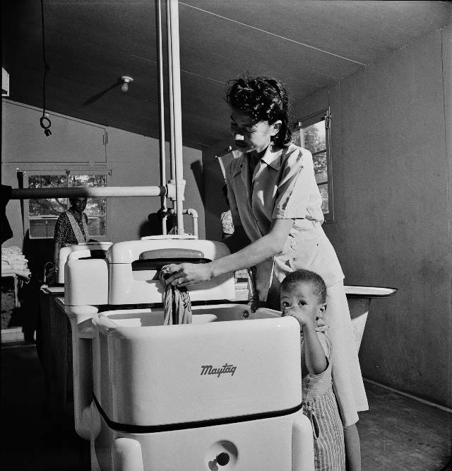 Well-equipped laundry in the community building at a FSA (Farm Security Administration) housing relief camp for African-Americans, Arlington, Virginia, April 1942