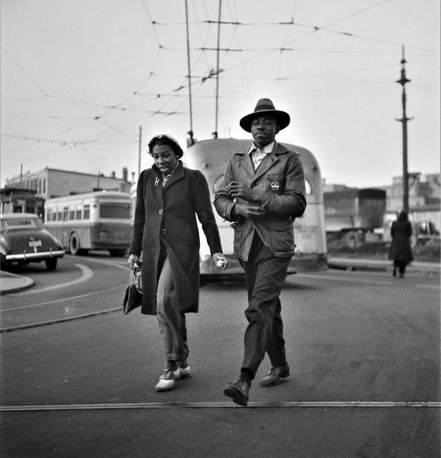 Workers hurrying to catch a conveyance for work at seven a.m., Baltimore, Maryland, April 1943