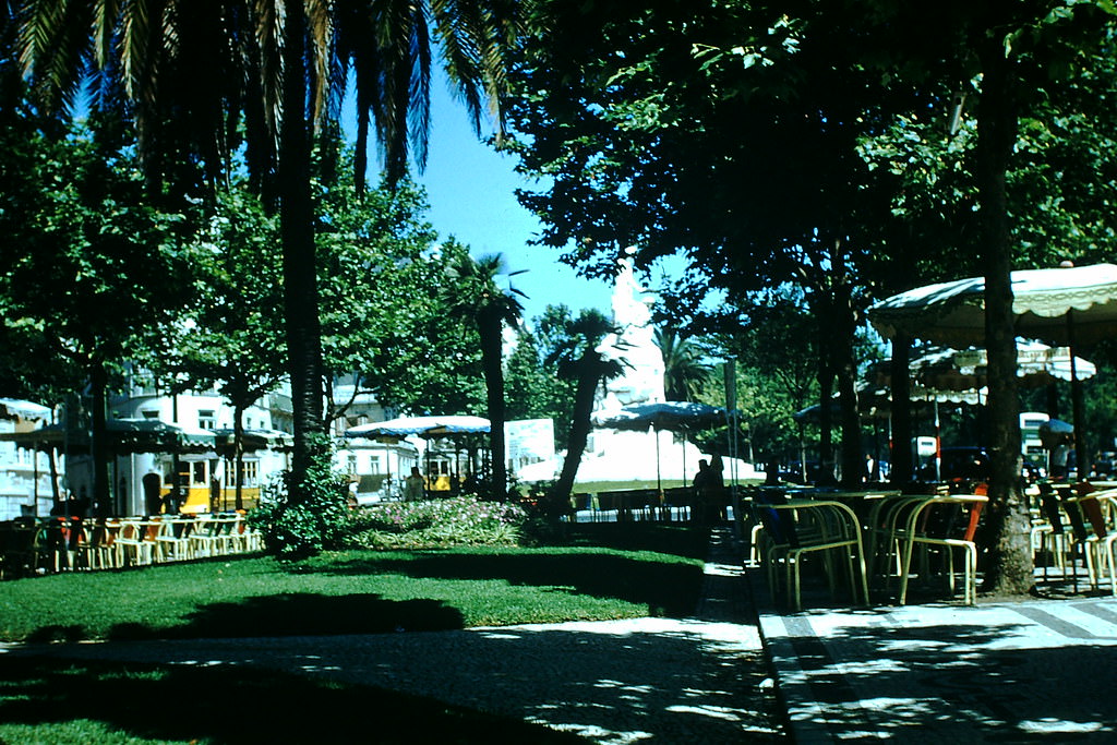 Parkway Sidewalk Cafe and Statue, Lisbon, 1950s.