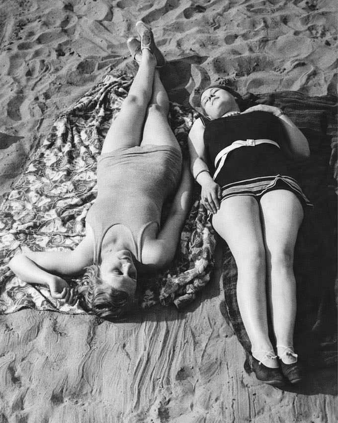 Two women sunbathing, ca. 1929