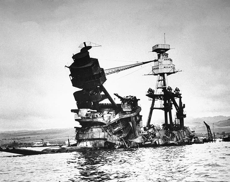 Exposed wreckage of the American battleship U.S.S. Arizona, most of which is now resting at the bottom of Pearl Harbor following a surprise Japanese attack on Dec. 7, 1941.
