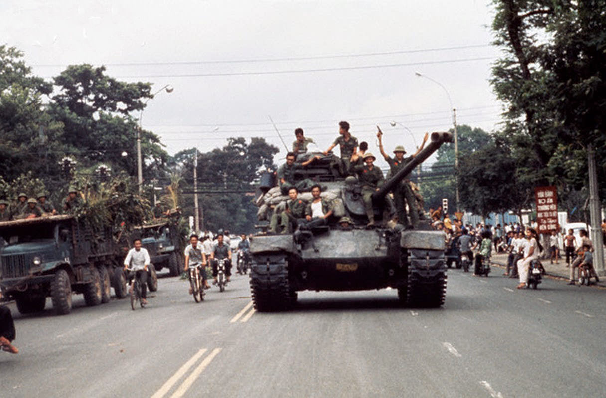 North Vietnamese troops enter Saigon on tanks and trucks, ending the Vietnam War.