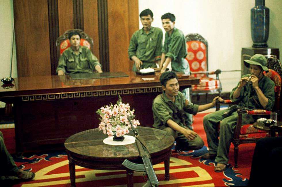 Saigon in Vietnam on April 30, 1975 - G.P.R soldiers and North Vietnamese soldiers in Doc Lap palace after the fall of Saigon on April 30,1975