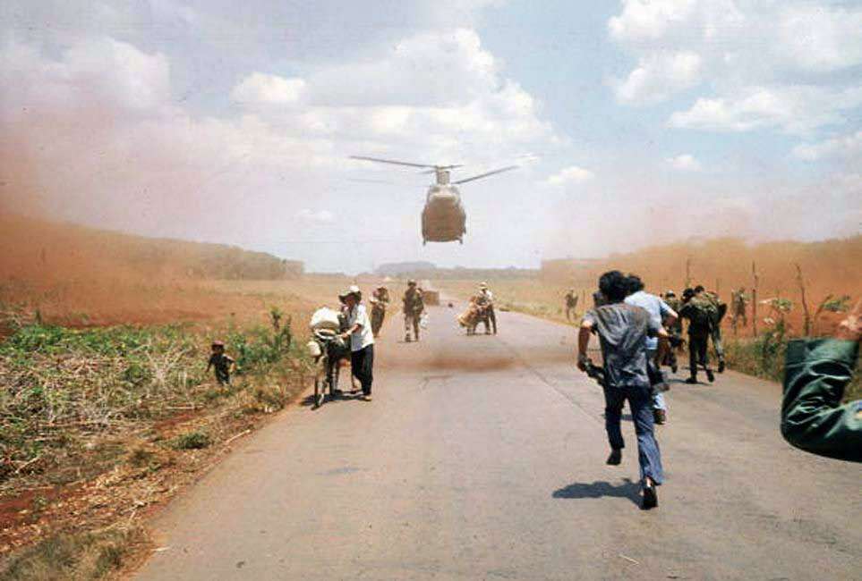 South Vietnamese flee Saigon April 1975 with the help of the U.S. military.