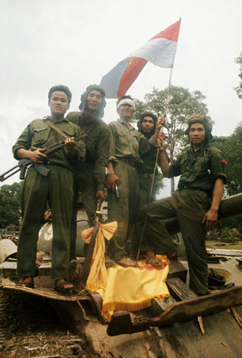 Popular jubilation as North Vietnamese troops enter Saigon, 30 Apr 1975, Saigon, South Vietnam.