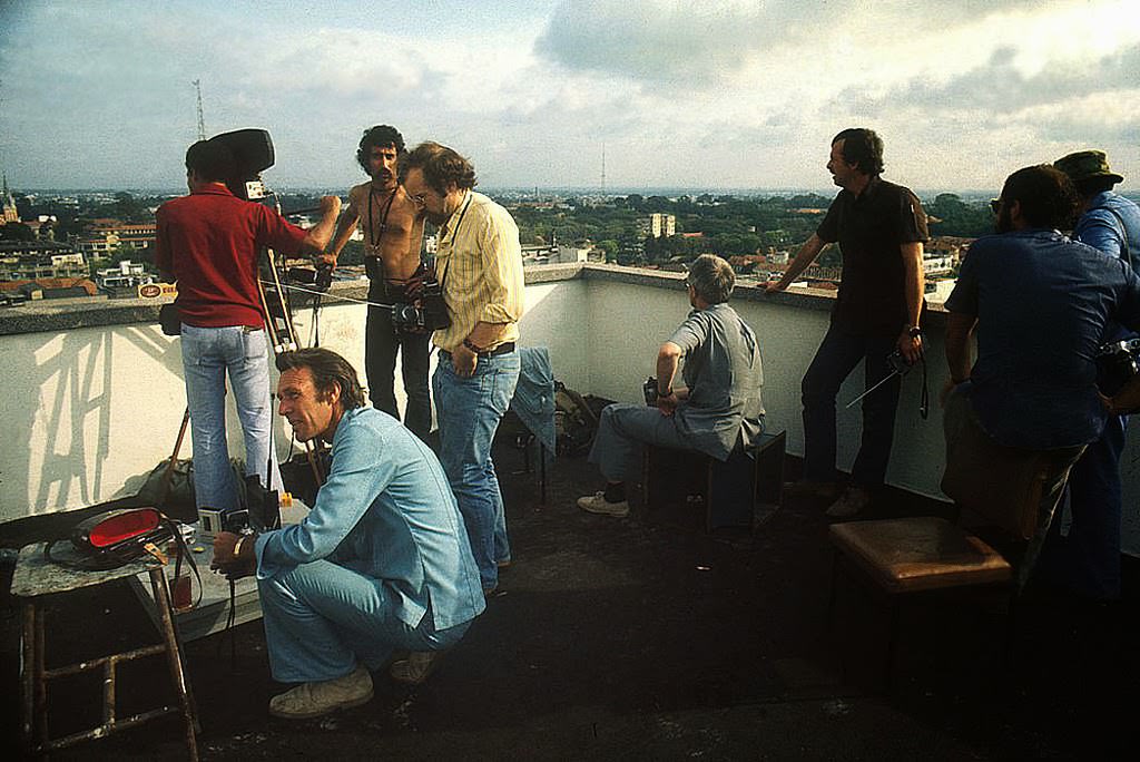 As Saigon falls to the communist rule of North Vietnamese, reporters cover the story April, 1975 from a roof top.