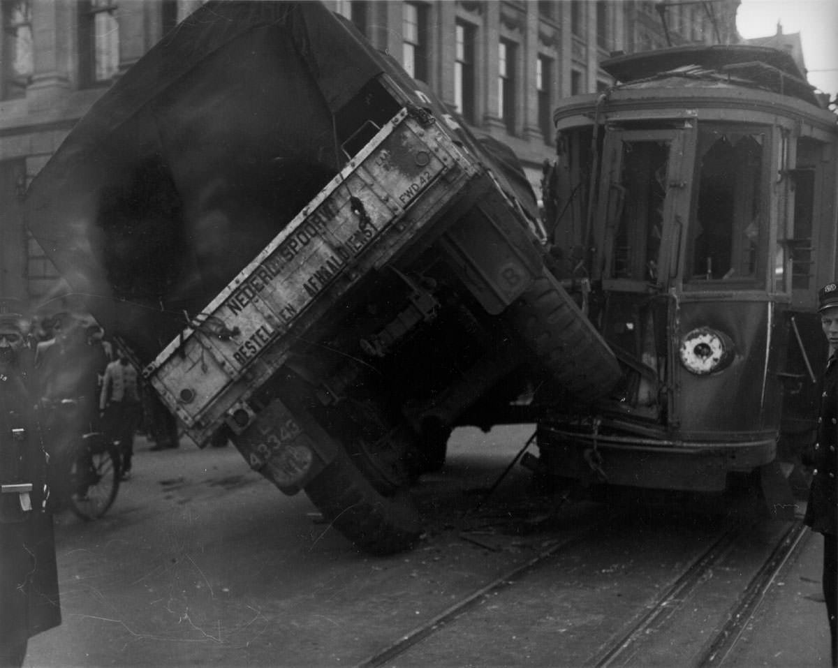 Truck of the Dutch Railways hit the tram, half on its side, Raadhuisstraat, Amsterdam, April 14, 1947