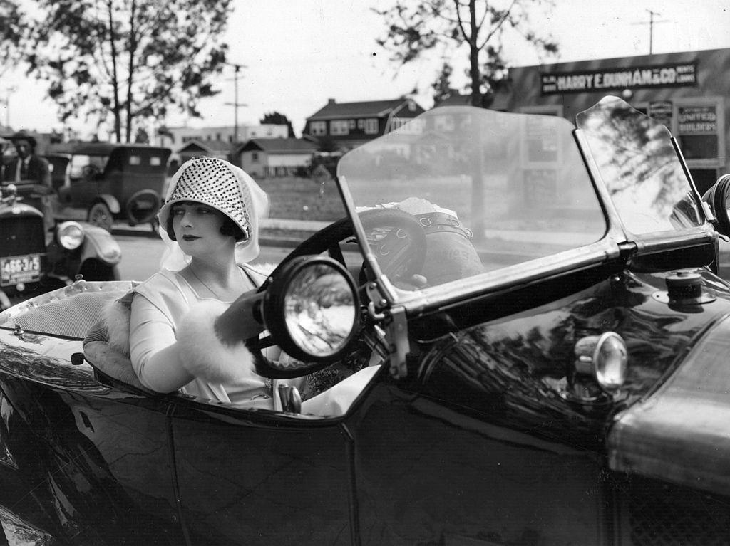 Alice Terry drives to the studio where she will be working on the MGM film 'The Great Divide', 1924.