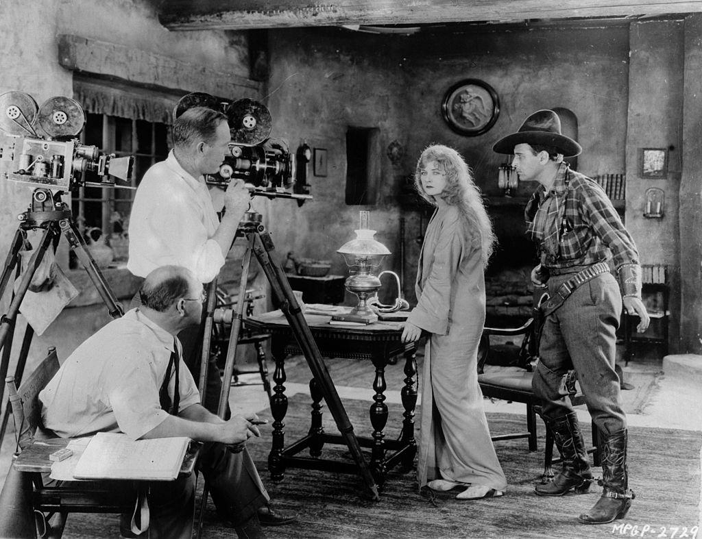 Alice Terry and Conway Tearle during the filming of 'The Great Divide', with director Reginald Barker, 1925.