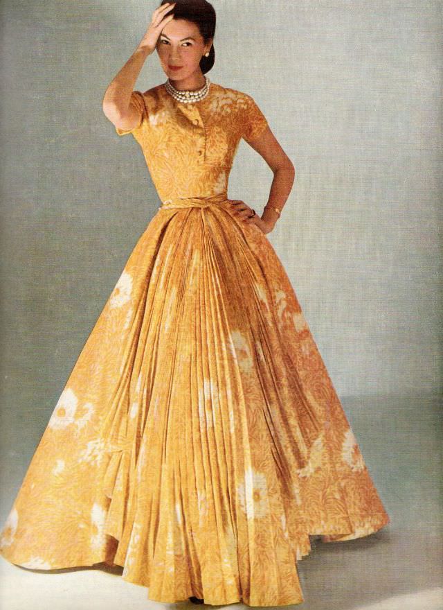 Alla in pleated floral print evening dress by Christian Dior, 1952
