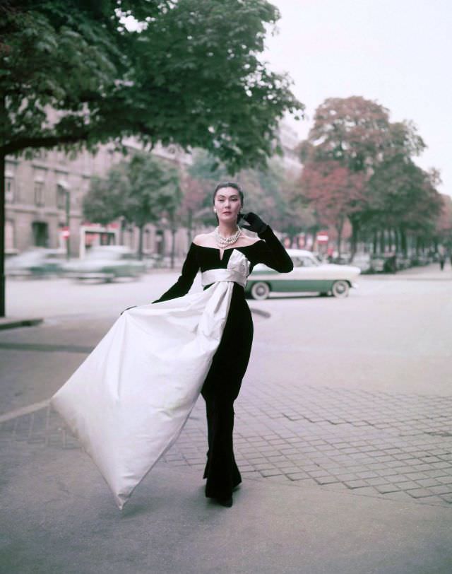 Alla wearing the iconic evening gown designed by Yves Saint Laurent for Christian Dior, Paris, 1955
