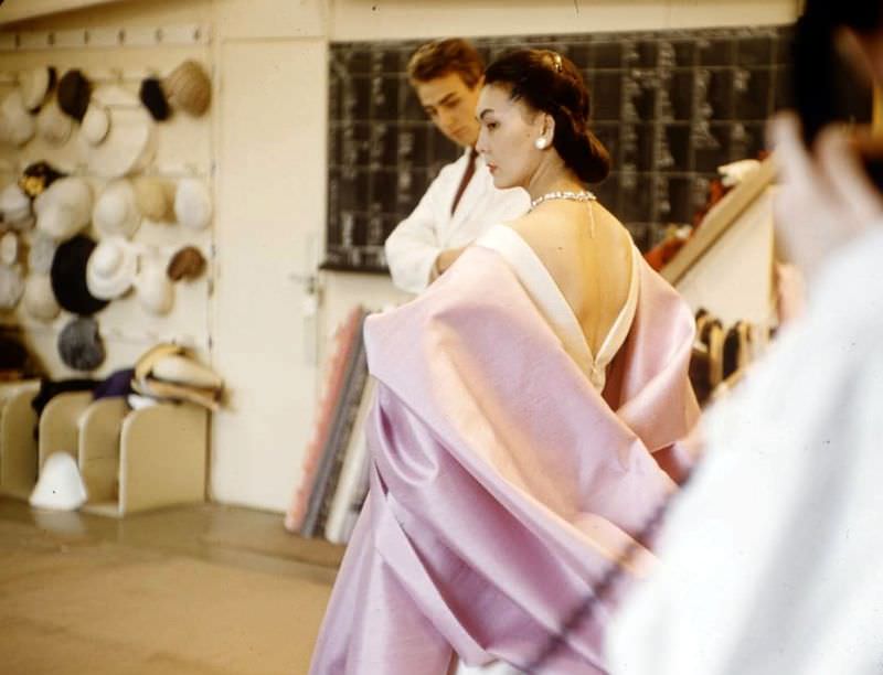 Alla being fitted in one of Dior's gowns, photo by Loomis Dean, 1957