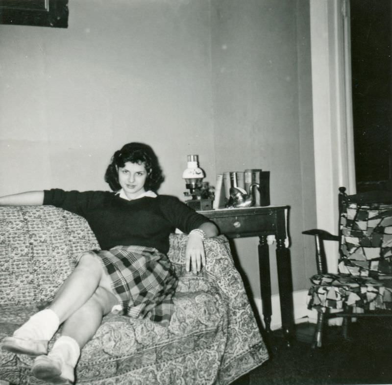 Teenage girl posing on couch