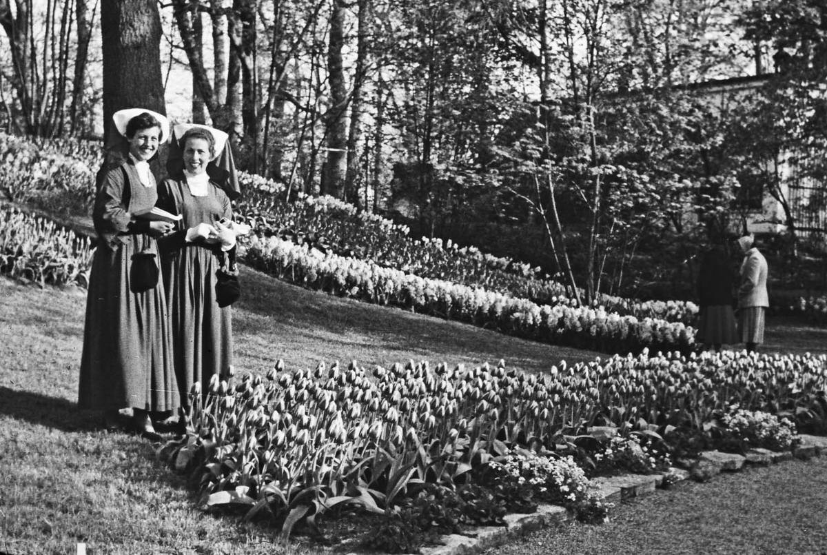 Two nuns enjoying in the park, Amsterdam, 1958.