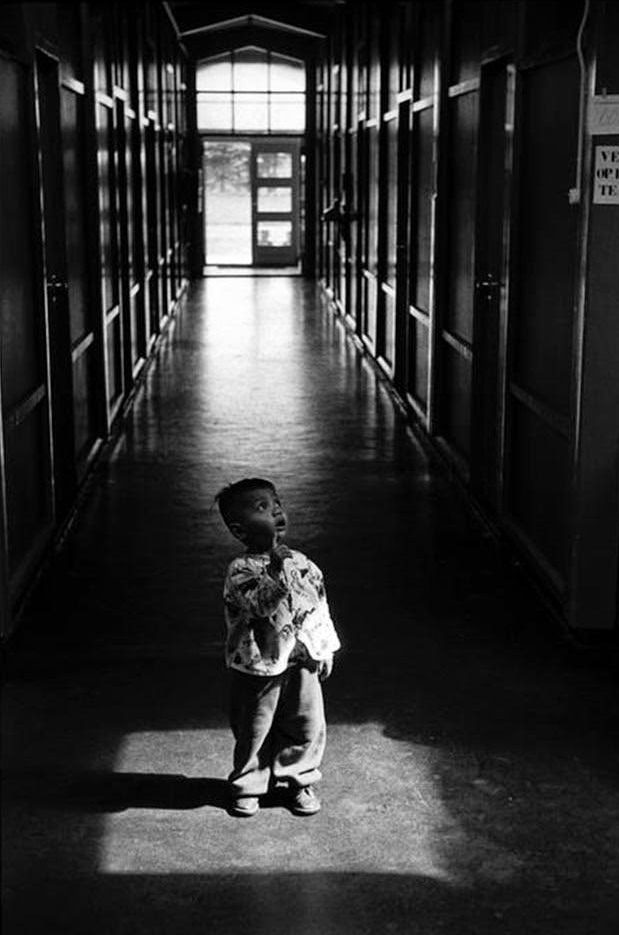 An Indonesian child arrives at a refugee camp in Holland, Amsterdam, 1964