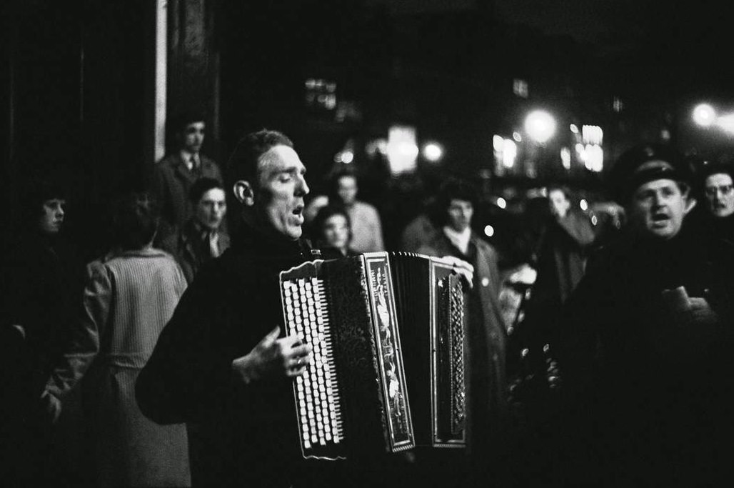 Salvation Army workers sing in the Red Light District, Amsterdam, 1964