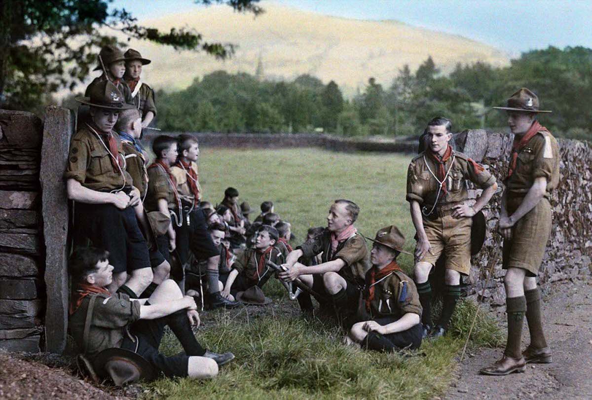 English Boy Scouts on a hike stop for a rest near Ambleside, north-west of Windermere in Cumbria in 1929.