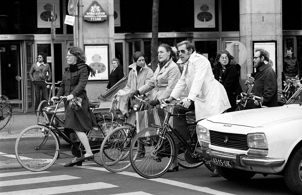 People getting around the town by bicycle in Amsterdam, Holland, 1975.
