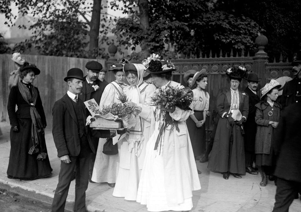 Christabel Pankhurst and Emmeline Pethick-Lawrence buying heather, 1910.