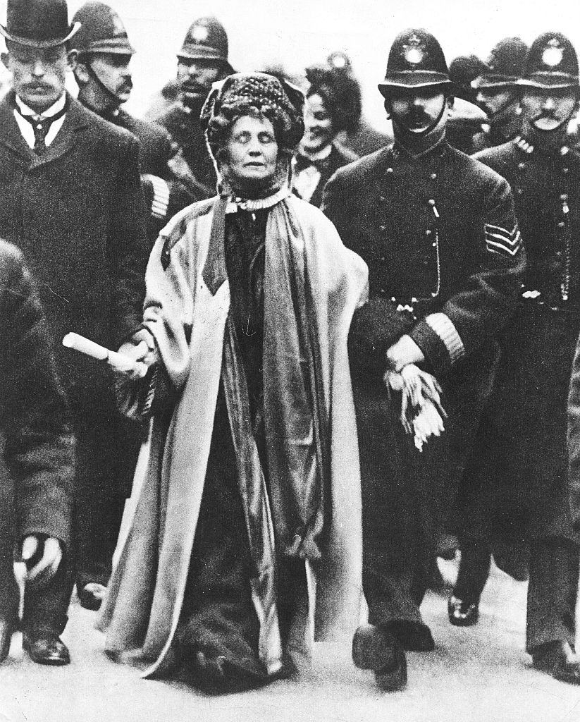 Emmeline Pankhurst at her eleventh arrest is taken by the police officer, 1911.