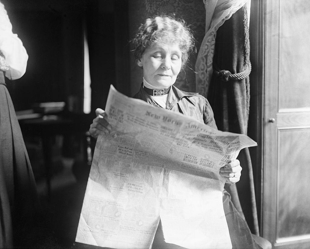 Emmeline Pankhurst Reading the New York American in Manhattan Hotel Apt, 1916.