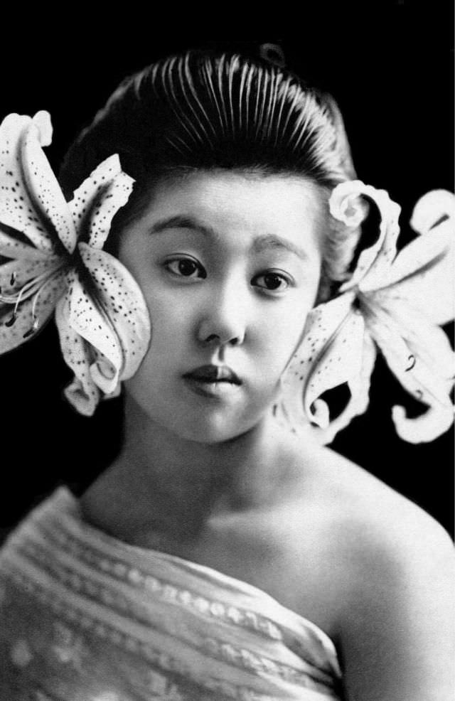 A geisha with lilies