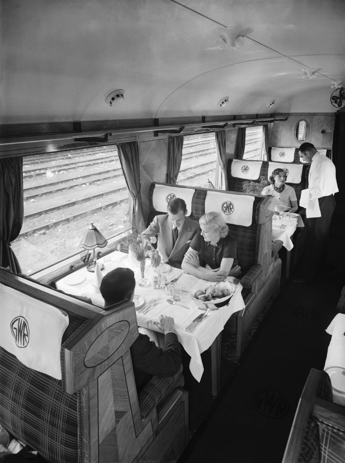 Passengers in a first class Great Western Railway dining car, 1938.