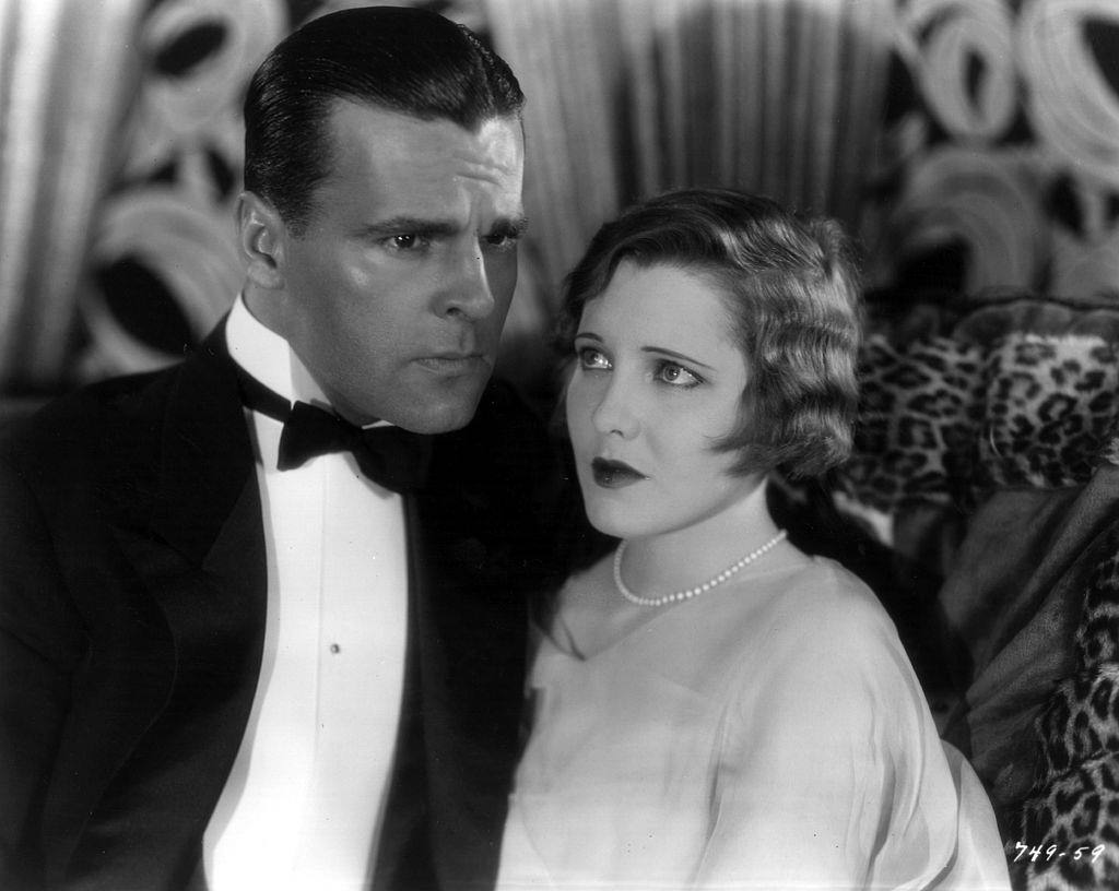 Jean Arthur with Neil Hamilton in a tense moment from the film 'The Insidious Dr Fu Manchu', 1931.