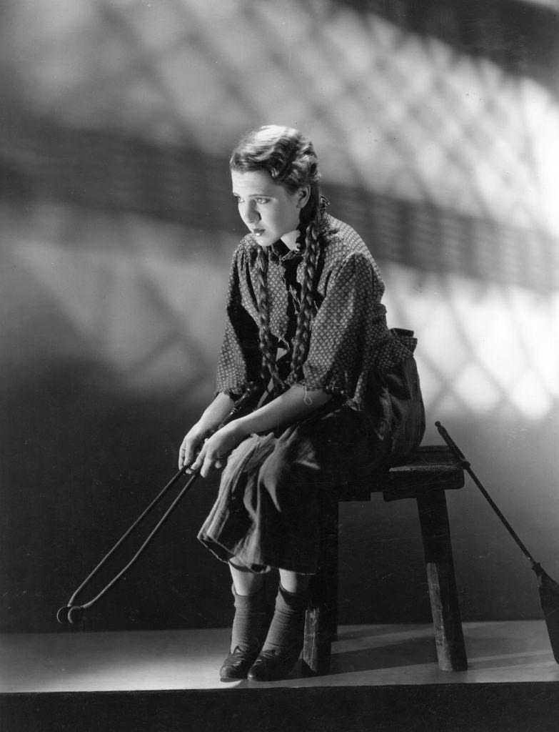 Jean Arthur sitting looking forlorn as the 'twelve o'clock girl', Cinderella, 1925.