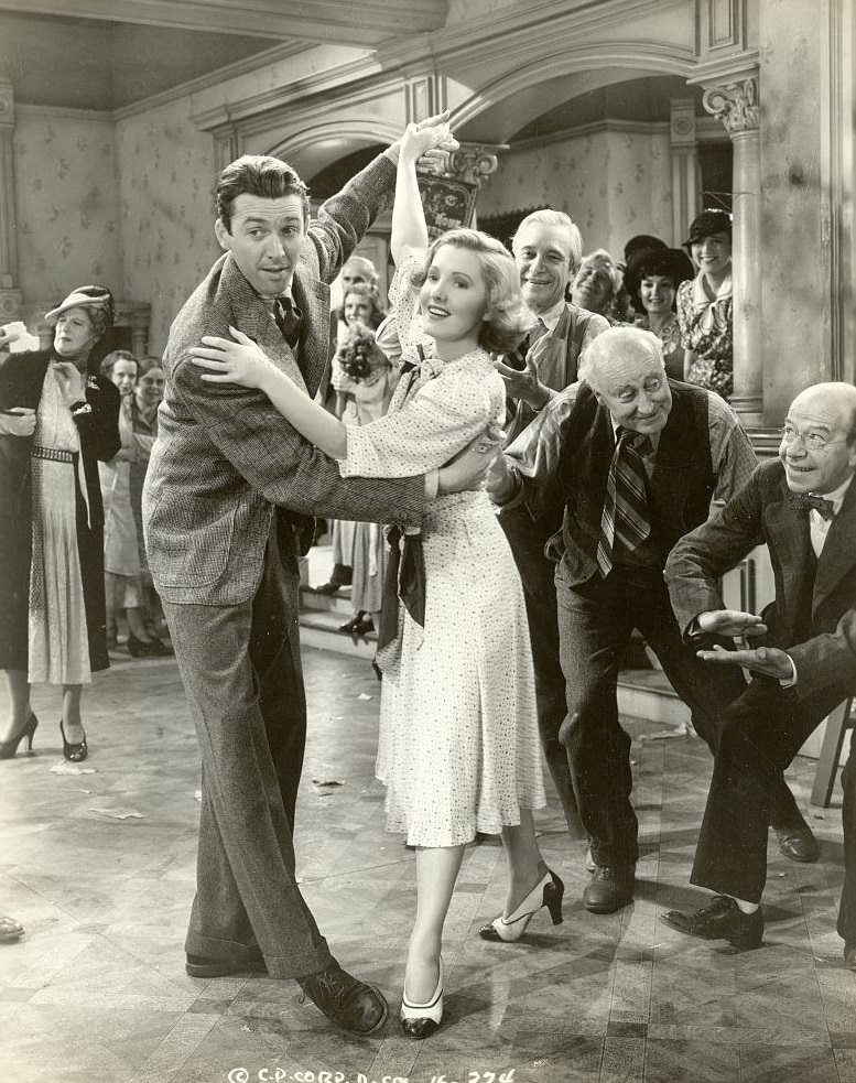 Jean Arthur dancing with James Stewart in the movie 'You Can't Take it With you', 1938.