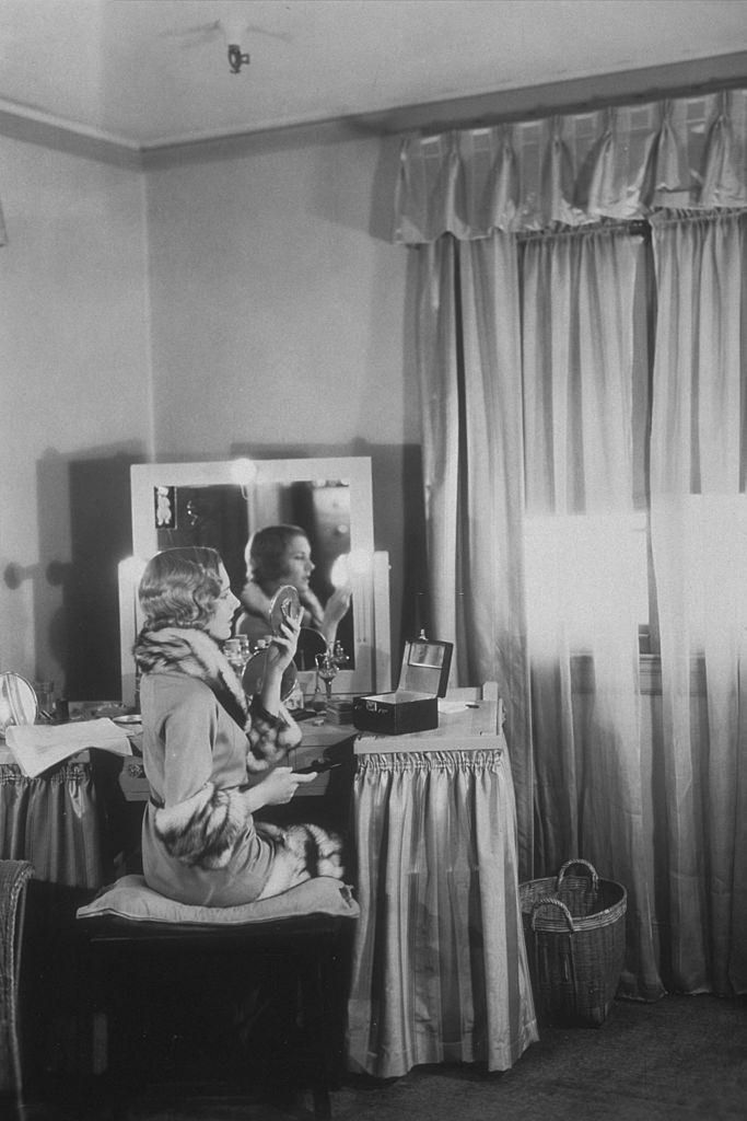 Jean Arthur at her dressing table during a break from filming 'The Gang Buster', 1931.