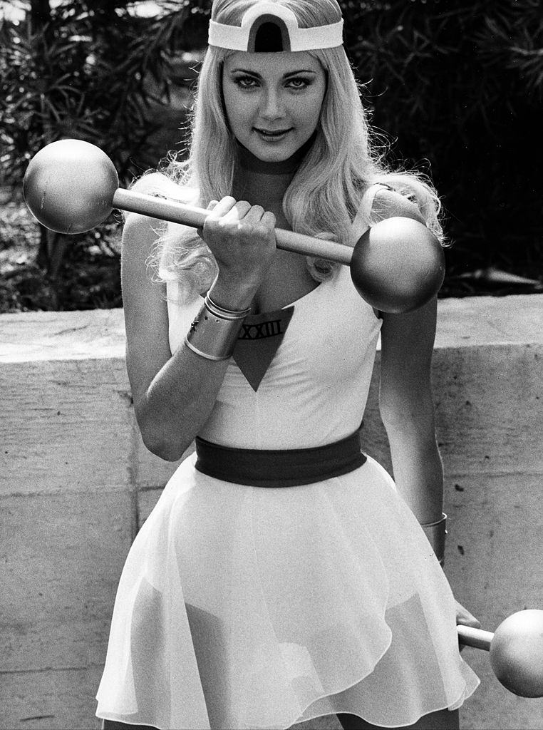 Lynda Carter holding a dumbell in 'The New Original Wonder Woman', 1975.