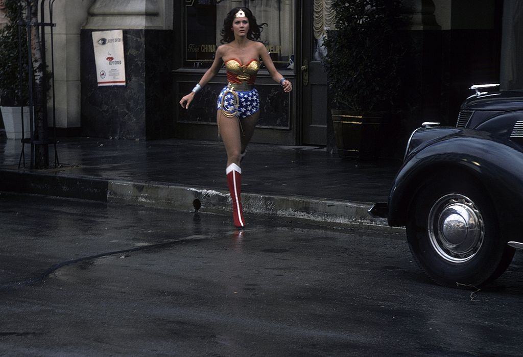 Lynda Carter chasing a car in 'The New Original Wonder Woman', 1975.