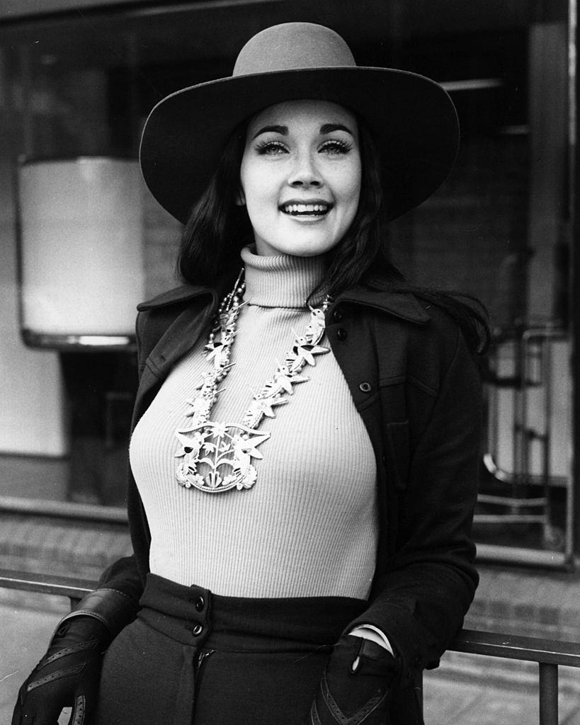 Lynda Carter wearing an Indian necklace, at London Airport for the Miss World Contest at the Royal Albert Hall, 1972.