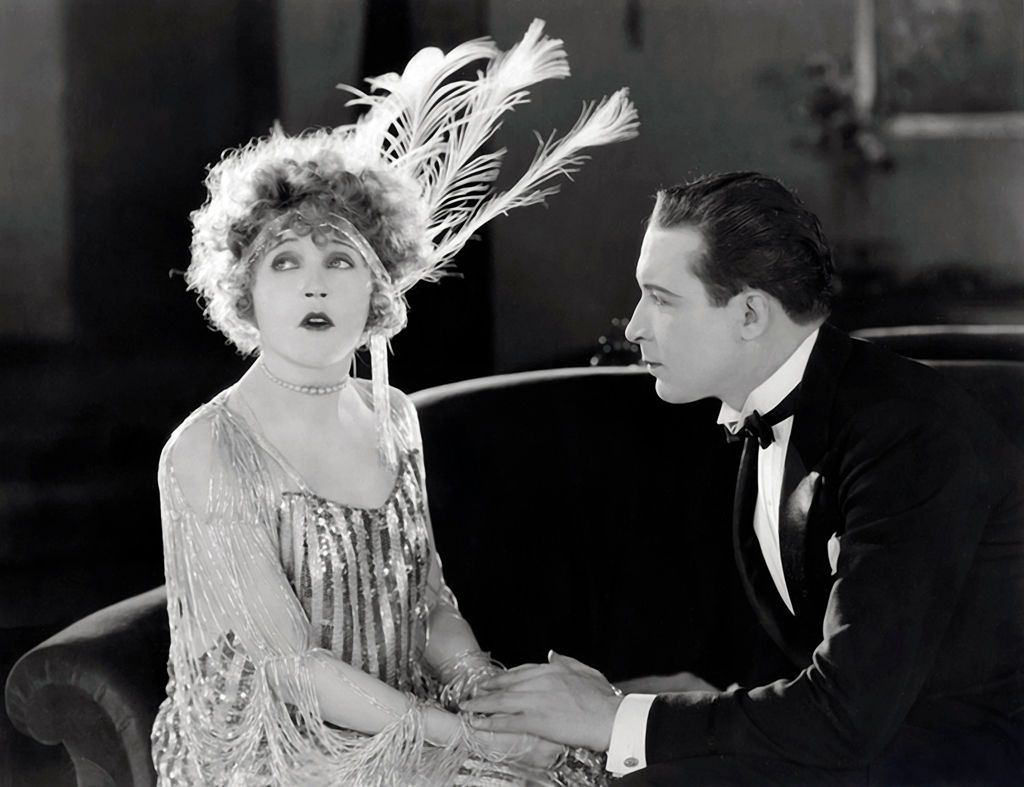 Mae Murray and Monte Blue in a scene from the movie 'Broadway Rose', 1922.