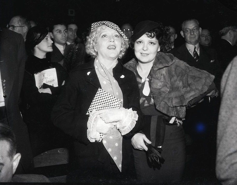 Mae Murray with Clara Bow, 1935.