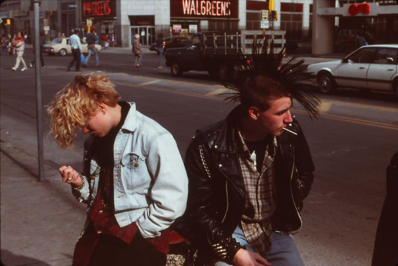 Punks on Hennepin Avenue, in front of Hot Licks/Wax Museum record store, Minneapolis, March 1985