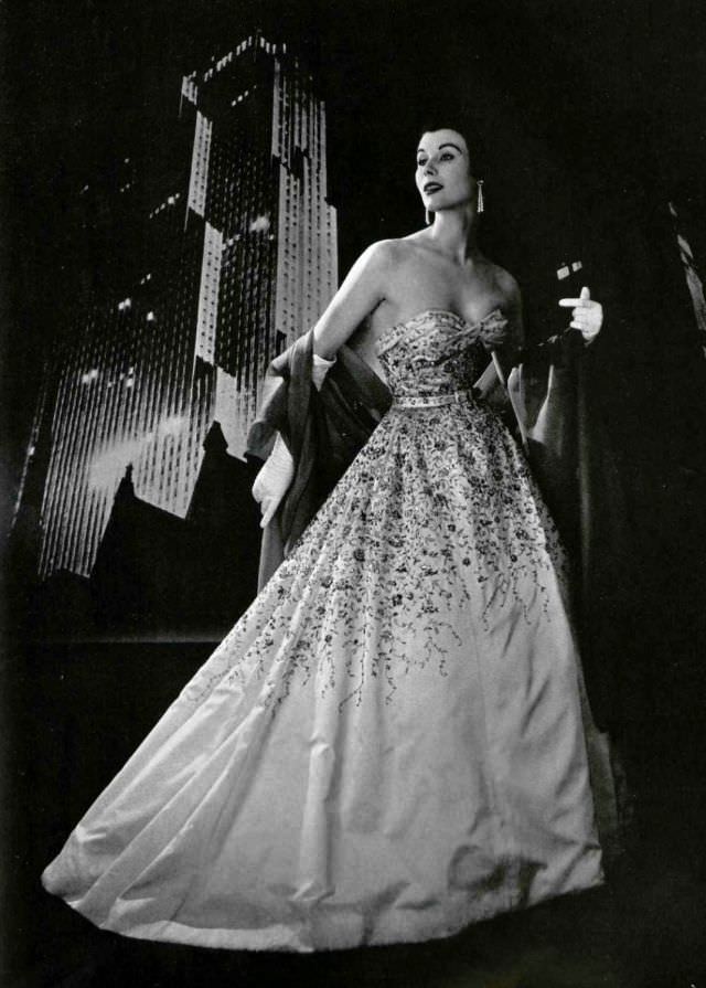 Myrtle Crawford in embroidered evening gown by Pierre Balmain, 1953