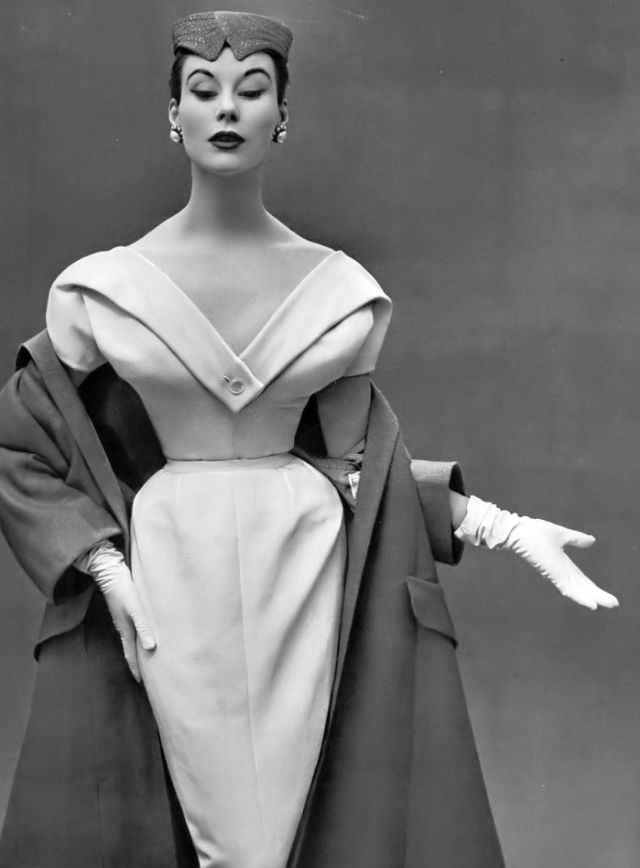 Myrtle Crawford in this new silhouette by Christian Dior, the significantly widened shoulders give the bust new proportions, 1953