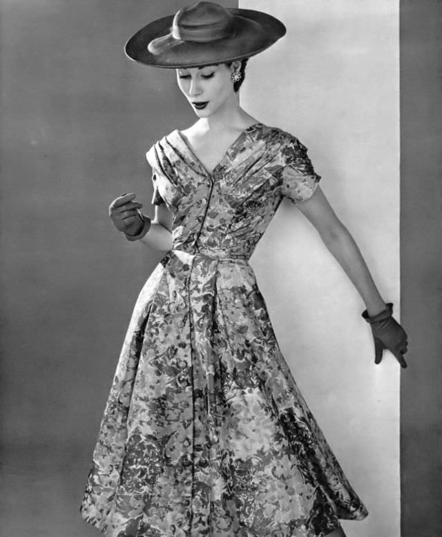 Myrtle Crawford in silk floral print of grays and pinks, perfect for a garden party, by Jean Dessès, 1954.