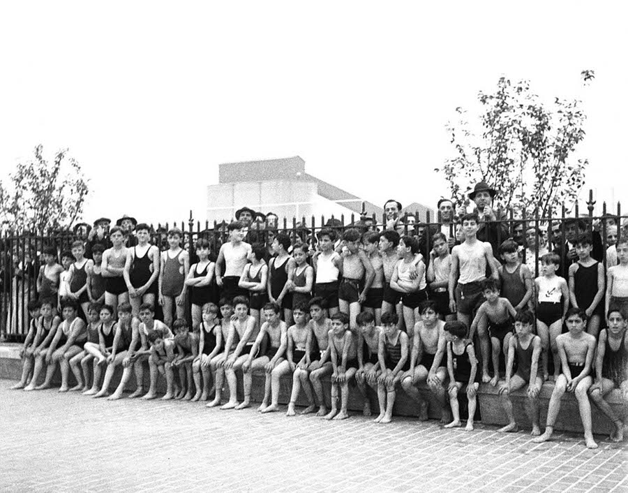 A group of young children are pictured above while waiting for the new pool at Thomas Jefferson Park to open on June 27, 1936 in East Harlem, New York.