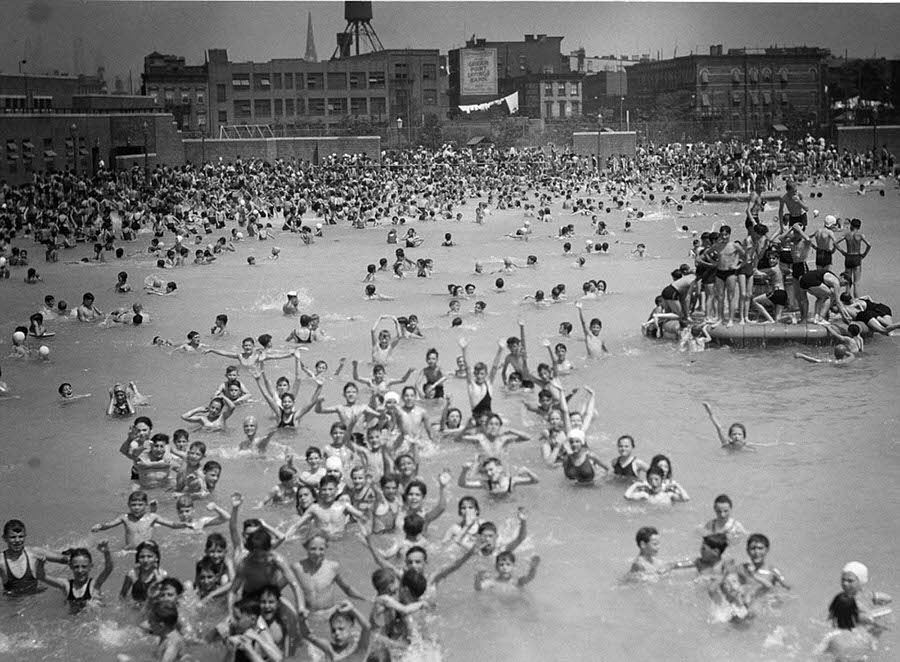 A super-crowded McCarren Park pool in Brooklyn during the summer of 1937; the park and pool still exist today.