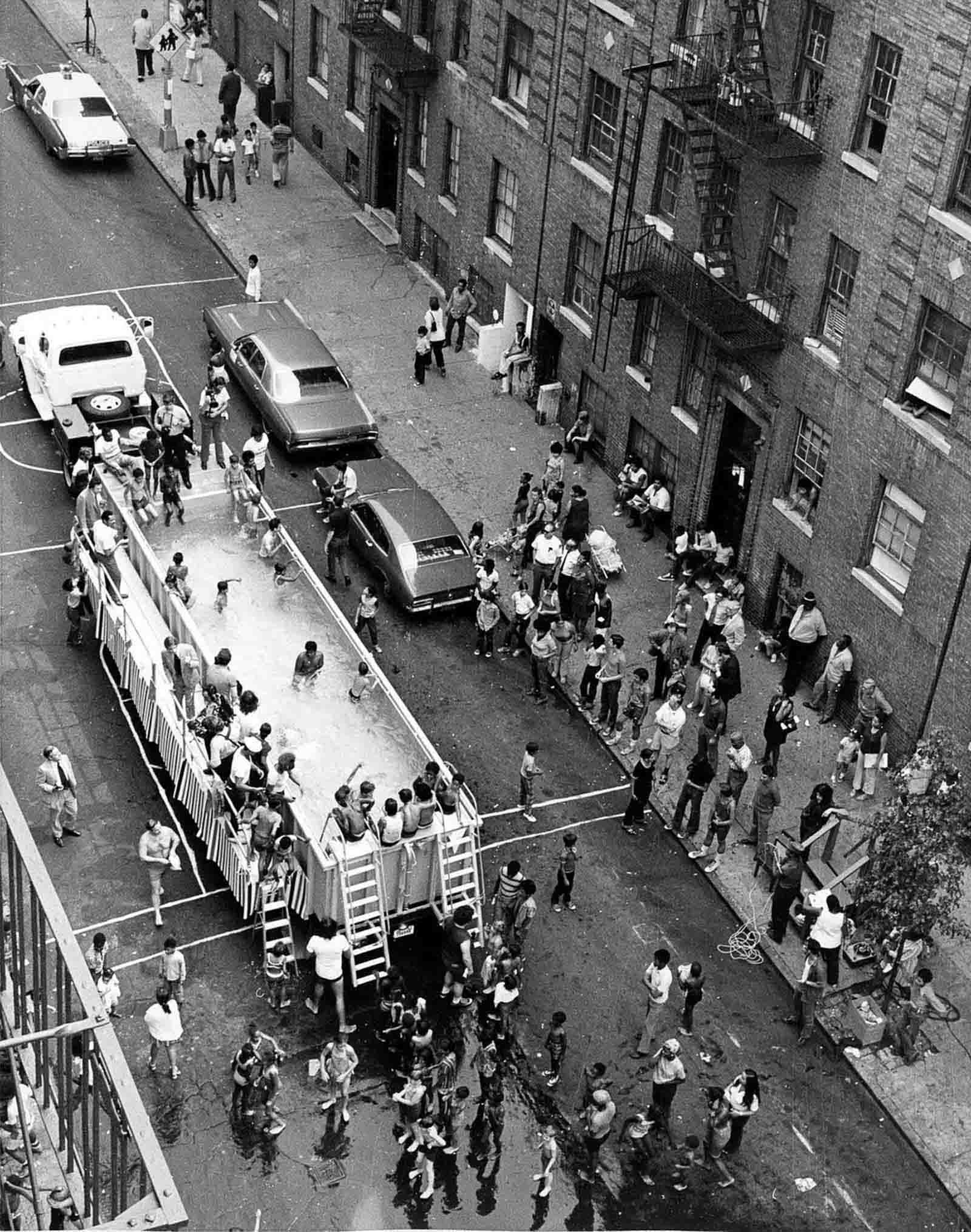 Dozens of children and adults crowded in and around what was called a ‘swimmobile’ in the late 1960s.