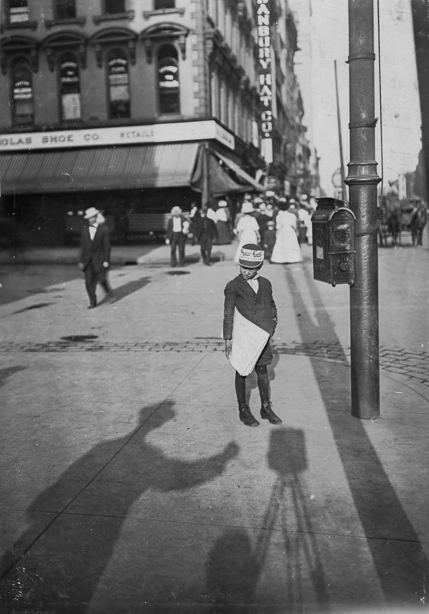 John Howell, makes 75 cents some days. Begins at 6 a.m., Sundays. (Lives at 215 West Michigan Street). Indianapolis, Indiana, 1908.